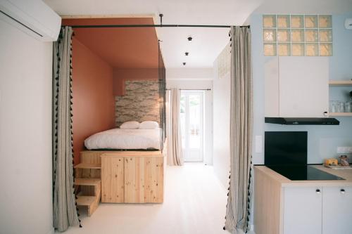 En eller flere senge i et værelse på l'atelier de Georges-152