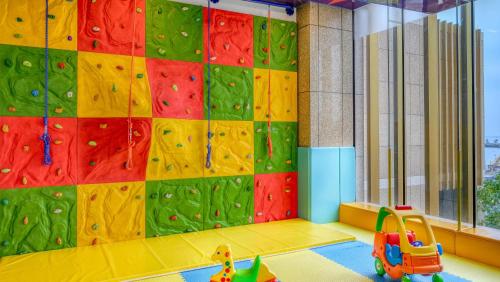 a childs play room with a climbing wall at Crowne Plaza Beihai Silver Beach by IHG in Beihai