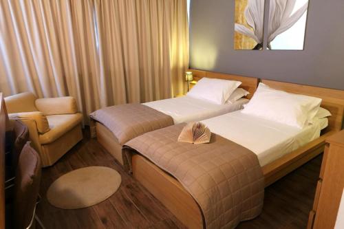 Кровать или кровати в номере Michelangelo Etna Hotel