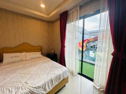 Postel nebo postele na pokoji v ubytování The Modiz Pool Villa Hua Hin 19