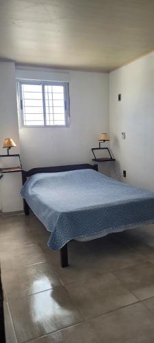 Katil atau katil-katil dalam bilik di Apartamento Romian Román