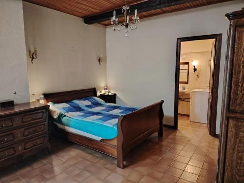 Ένα ή περισσότερα κρεβάτια σε δωμάτιο στο Maison Familiale avec Vue à Villefranche-de-Conflent