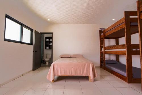 Katil atau katil-katil dalam bilik di House with Terrace & Pool in Coyula Ideal Groups