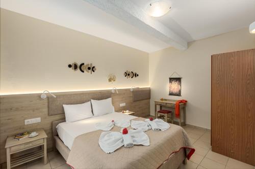 Katil atau katil-katil dalam bilik di Sunrise Hotel & Apartments