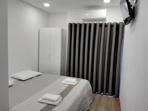 Ένα ή περισσότερα κρεβάτια σε δωμάτιο στο Green House