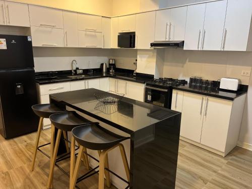 Nhà bếp/bếp nhỏ tại Departamento nuevo, lujoso y espacioso