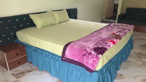 Hotel Prisha Recidencyにあるベッド