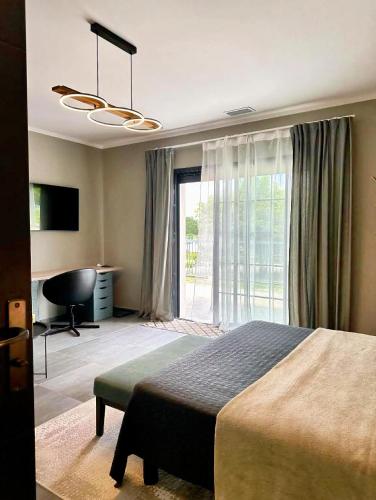 Katil atau katil-katil dalam bilik di Chambre style hôtel