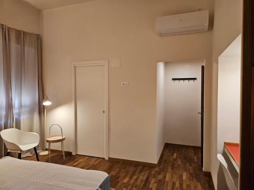Come a Casa luxury roomsにあるベッド