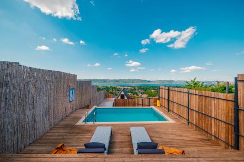 a deck with a swimming pool on top of a house at tetova in Sapanca