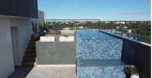 Swimmingpoolen hos eller tæt på Magnífico departamento en San Lorenzo