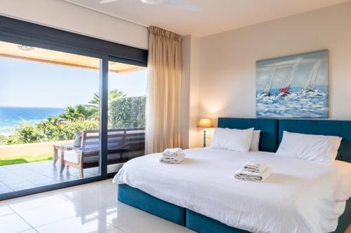 Postel nebo postele na pokoji v ubytování Lavender Villas Chania