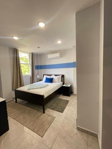 Cama o camas de una habitación en Somos Hotel San Juan