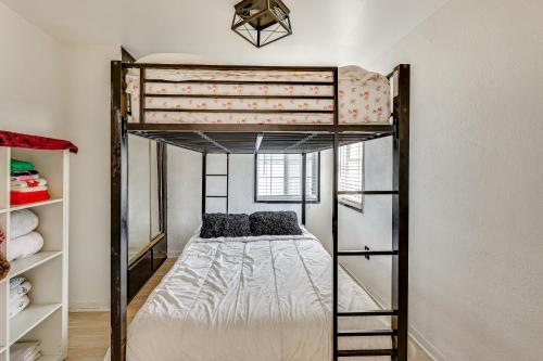 a bedroom with a bunk bed and shelves at Fullerton Home Base Easy Access to Dtwn and CSUF! in Fullerton