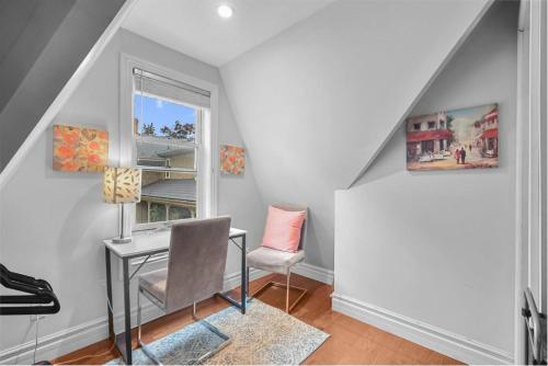 a home office with a desk and a chair at 2BR Downtown Retreat Mins to Beach BBQ and Firepit in Cobourg