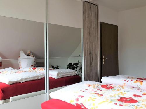 Ένα ή περισσότερα κρεβάτια σε δωμάτιο στο Holiday apartment Comfortable holiday residence