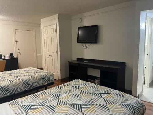 Studio 6 Suites Euless, TX – DFW Westにあるベッド