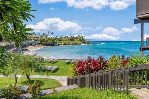 a view of the ocean from a house at Kahana Sunset B4B in Kahana