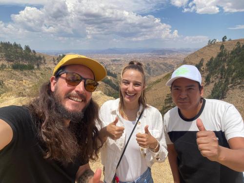 a group of three people giving the thumbs up at Sweet Forest Glamping in Sucre
