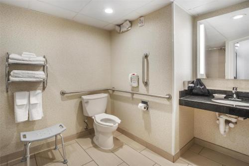 a bathroom with a toilet and a sink at Best Western Plus Keene Hotel in Keene