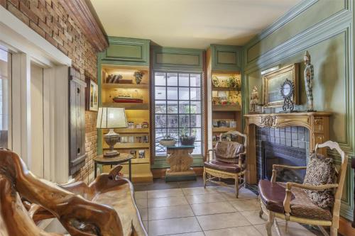 a living room filled with furniture and a fireplace at Best Western Fireside Inn in Kingston