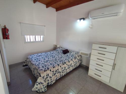 Postel nebo postele na pokoji v ubytování Monoambiente San Antonio Oeste