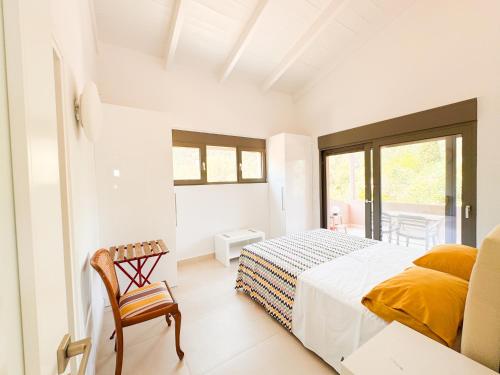 En eller flere senge i et værelse på eucalyptus--top floor beachfront apartment