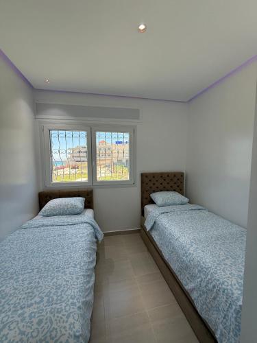 Una cama o camas en una habitación de KsarMedApart
