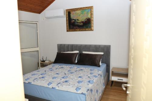 Ένα ή περισσότερα κρεβάτια σε δωμάτιο στο Villa in Qerret - 100 m from the beach