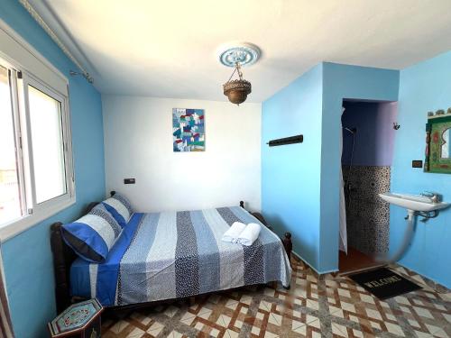Postel nebo postele na pokoji v ubytování Beach House