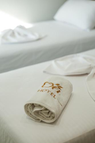 Postel nebo postele na pokoji v ubytování OLI Hotel