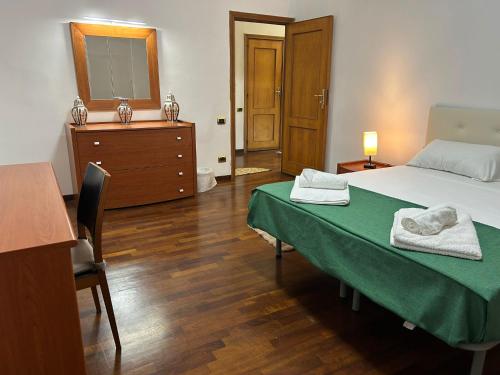 Ein Bett oder Betten in einem Zimmer der Unterkunft Merdionale51