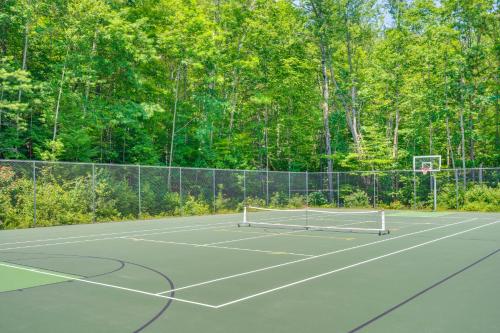 a tennis court with a basketball hoop on it at half Mi to Campton Mtn Resort-Style Condo in Campton