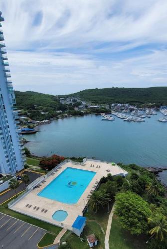 an aerial view of a large body of water at Beachfront Balcony With Marina Views Pool in Fajardo