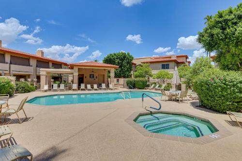a swimming pool with chairs and a house at Resort-Style Gem with Pool Access 10 Mi to Dtwn PHX in Phoenix