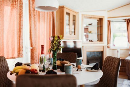 a table with a bunch of food on it at Villa Hexengericht in Thale