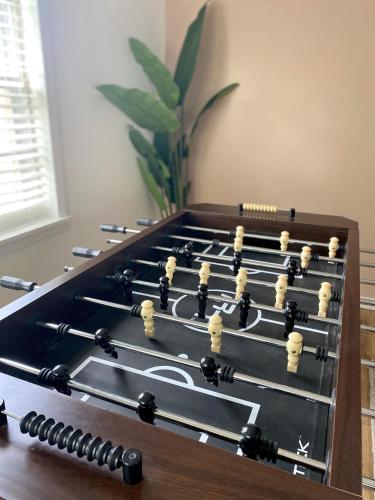 a game of chess is shown on a table at The Parkway House in Bryan