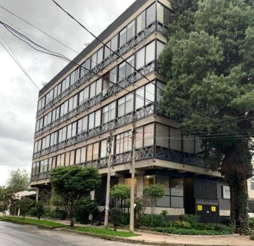 a large building on the side of a street at Hermoso Apartaestudio LOFT in Bogotá