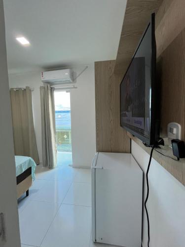 Televisyen dan/atau pusat hiburan di Lucky Suites Jorro