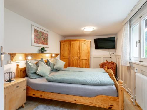Ein Bett oder Betten in einem Zimmer der Unterkunft Bühelhus