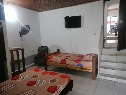Katil atau katil-katil dalam bilik di Casa de relajación low cost