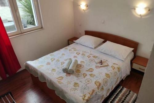 Apartments with parking space Krapanj, Sibenik - 24787