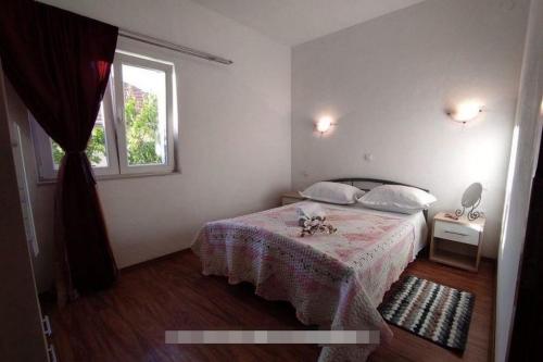 Apartments with parking space Krapanj, Sibenik - 24787