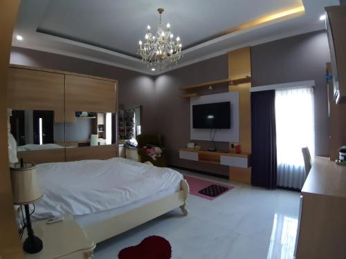 Ένα ή περισσότερα κρεβάτια σε δωμάτιο στο Villa Casa Ilona