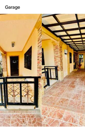 a hallway of a house with a gate and a porch at Lens Staycation 3BDR-2BR-Downstairs ,NetflixWifi in Panabo