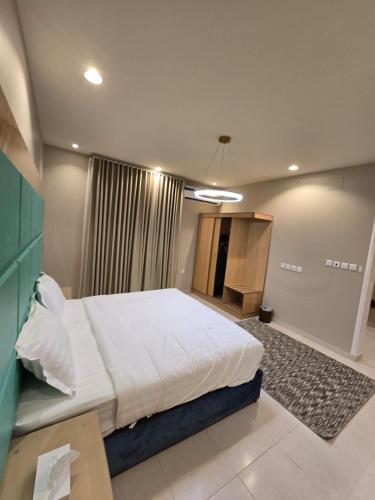 Ένα ή περισσότερα κρεβάτια σε δωμάτιο στο Rove Appartments