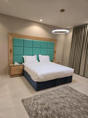 Ένα ή περισσότερα κρεβάτια σε δωμάτιο στο Rove Appartments