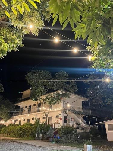 a building at night with lights on it at Jeryeong Forest Pension in Gapyeong