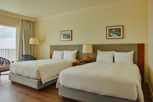 Cama o camas de una habitación en Lotte Hotel Guam