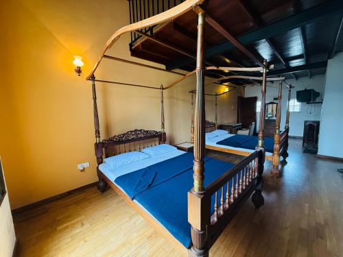 Cama o camas de una habitación en The Ranmin Lodge